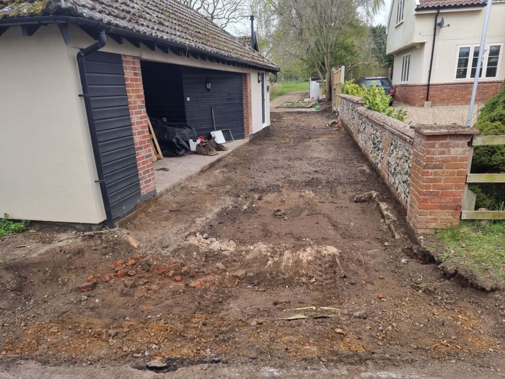 This is a tarmac driveway that is in the process of being dug out and installed by Felixstowe Driveway Services